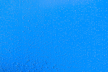 Blue Droplets background on a metal surface, Abstract design element