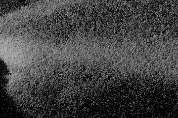 Crystal salt isolated on black background, top view