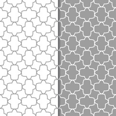 Fototapeta premium Gray and white geometric ornaments. Set of seamless patterns