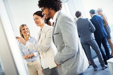 Business colleagues working in modern conference room