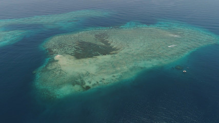 Fototapeta na wymiar seascape aerial view coral reef, atoll with turquoise water in sea.Tropical atoll, coral reef in ocean waters. Travel concept.
