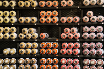 abstract colourful spray bottles on the shelf