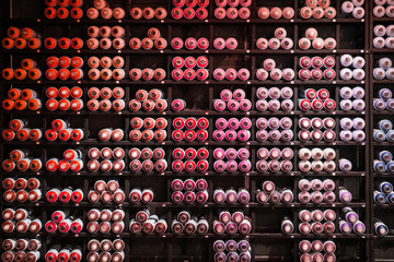 abstract colourful spray bottles on the shelf