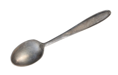 Top view of old silver beautiful tea spoon isolated on white background