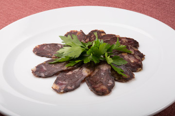 Slices of smoked horse meat