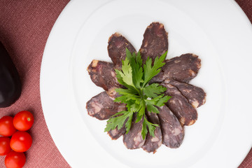 Slices of smoked horse meat