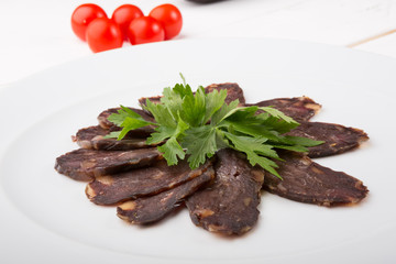 Slices of smoked horse meat
