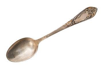 Vintage tea spoon  isolated on a white background. Retro silverware.