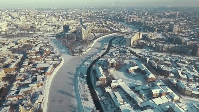 Kharkiv, Ukraine. Aerial of city center covered with snow, river crossing, snowy winter. urban landscape