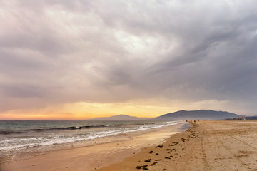 Fototapeta na wymiar Beach in Tarifa at sunset. Tarifa, Andalusia, Spain
