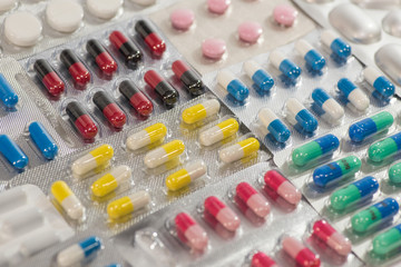 Many colorful pills, tablets, drugs and pharmaceutical substance close-up for patient and doctor 3
