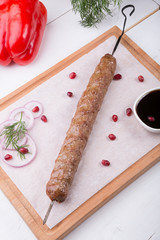 Kebab meat grilled on a skewer
