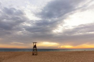 Lifeguard at beach in Tarifa at sunset. Tarifa, Andalusia, Spain