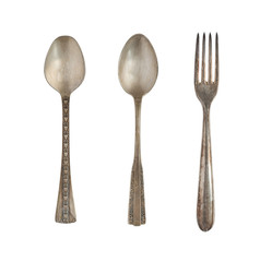 Vintage spoons and fork isolated on a white background. Retro silverware.