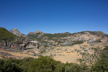 Fototapeta na wymiar White village in scenic landscape near Ronda, Andalusia, Spain