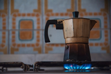 Classic Italian coffee maker on gas fire