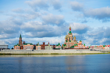 Fototapeta premium Embankment in Yoshkar-Ola. View of the Cathedral of the Annunciation. Russia, Republic of Mari El.