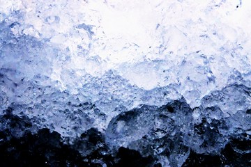Obraz premium Full frame ice background, frozen water, blue