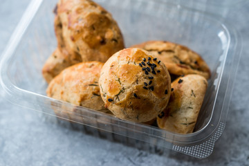 Salty Turkish Pastry with Dill / Pogaca in Plastic Container Box / Package.