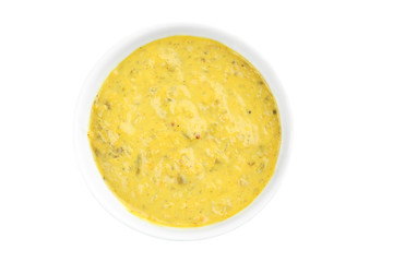 Tasty yellow sauce in bowl on white background