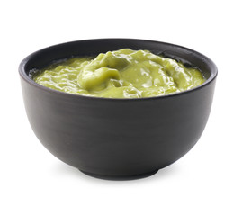 Tasty sauce in bowl on white background