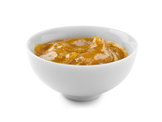 Tasty sauce in bowl on white background