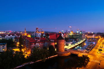 Night view of Brama Stagiewna and other historical buildings in Gdansk, Poland