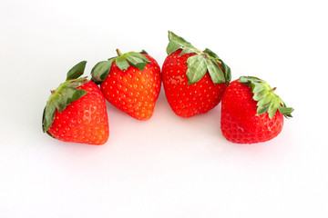 Fresh strawberry fruit isolated on white paper background.