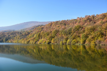 Small lake in autumn. Beautiful, colorful autumn lake
