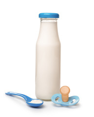 Bottle of milk with powder and pacifier on white background
