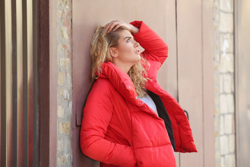 Depressed young woman outdoors