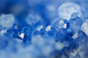Winter beautiful background of beautiful  of blue crystals. Macro shooting