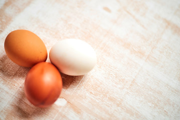 eggs and flour on wooden table