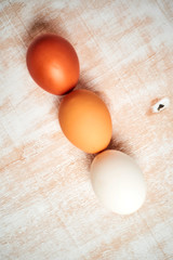 eggs and flour on wooden table