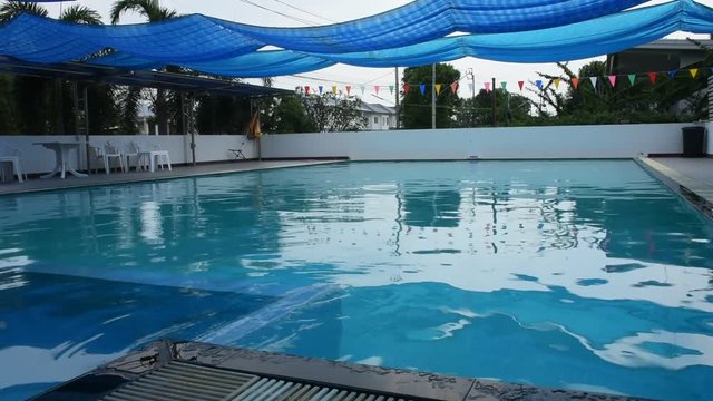 Swimming pools of sports club for people swim and playing at outdoor on November 22, 2018 in Nonthaburi, Thailand