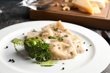 Tasty ravioli on plate, closeup