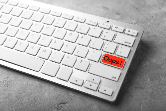 Text OOPS on PC keyboard button. Mistake concept