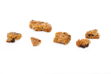 Detail of chip cookie leftovers isolated on white background.