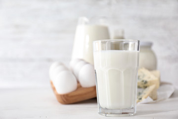 Glass of milk on light table