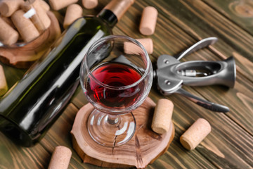 Glass of red wine on wooden stand