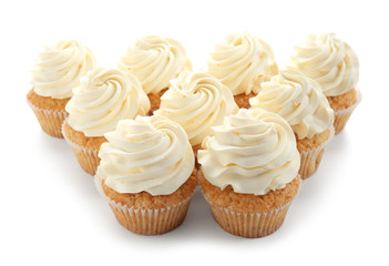 Delicious cupcakes on white background