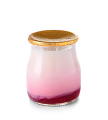 Jar with yogurt on white background