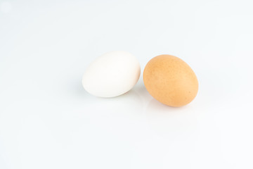 Two eggs isolated on white, copy space