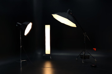 Obraz na płótnie Canvas Professional lighting equipment on dark background
