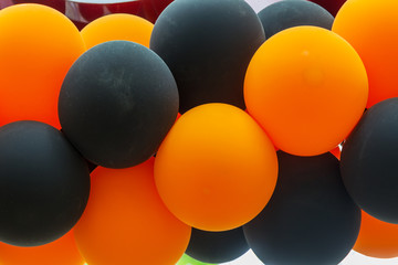 Bright festive multi-colored inflatable balls, black and orange, are woven into the colors of the traditional St. George ribbon - a symbol of Victory, valor with glory in the Great Patriotic War