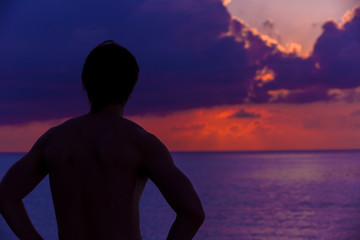 Silhouette of the Man looking at the Sunset. © Nemida