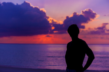 Silhouette of the Man looking at the Sunset. © Nemida
