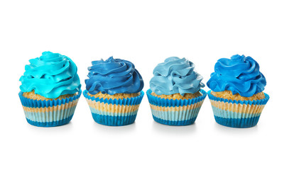 Delicious color cupcakes on white background