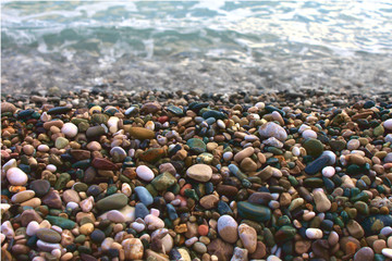 Colorful pebbles by the sea