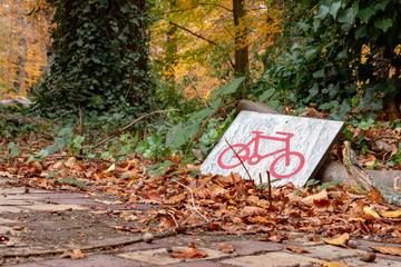 Abandoned sign indicating a bicycle parking